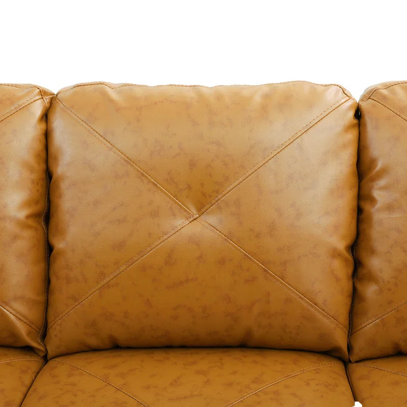 Beverlys 97" Wide Faux Leather Sofa & Chaise with Ottoman
