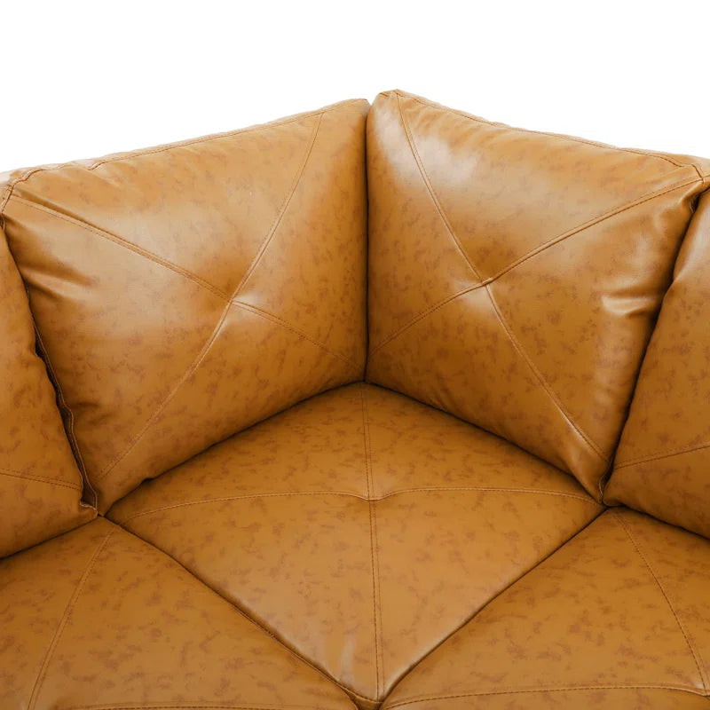 Beverlys 97" Wide Faux Leather Sofa & Chaise with Ottoman